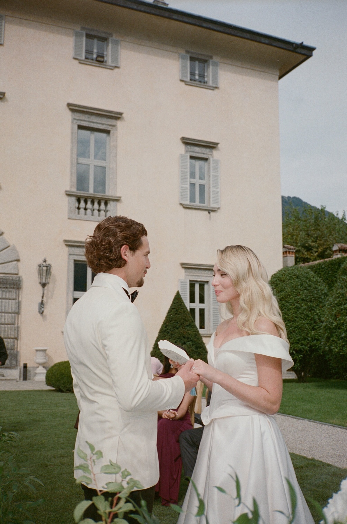 35mm film photograph of a couple outside a villa